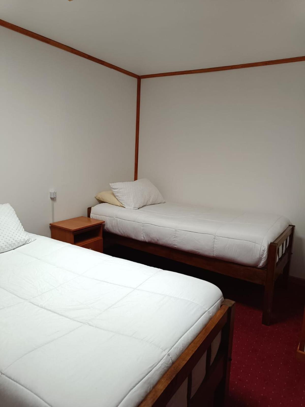 Hostal B&B Coastal Natales ปวยร์โตนาตาเลส ภายนอก รูปภาพ