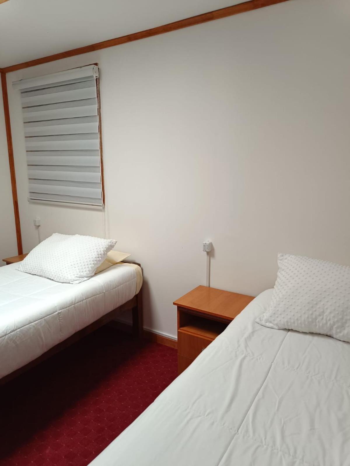 Hostal B&B Coastal Natales ปวยร์โตนาตาเลส ภายนอก รูปภาพ
