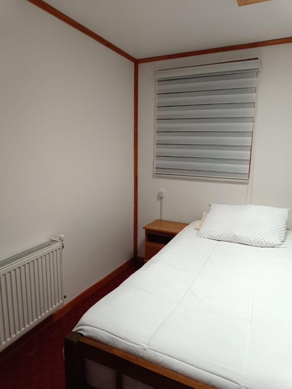 Hostal B&B Coastal Natales ปวยร์โตนาตาเลส ภายนอก รูปภาพ