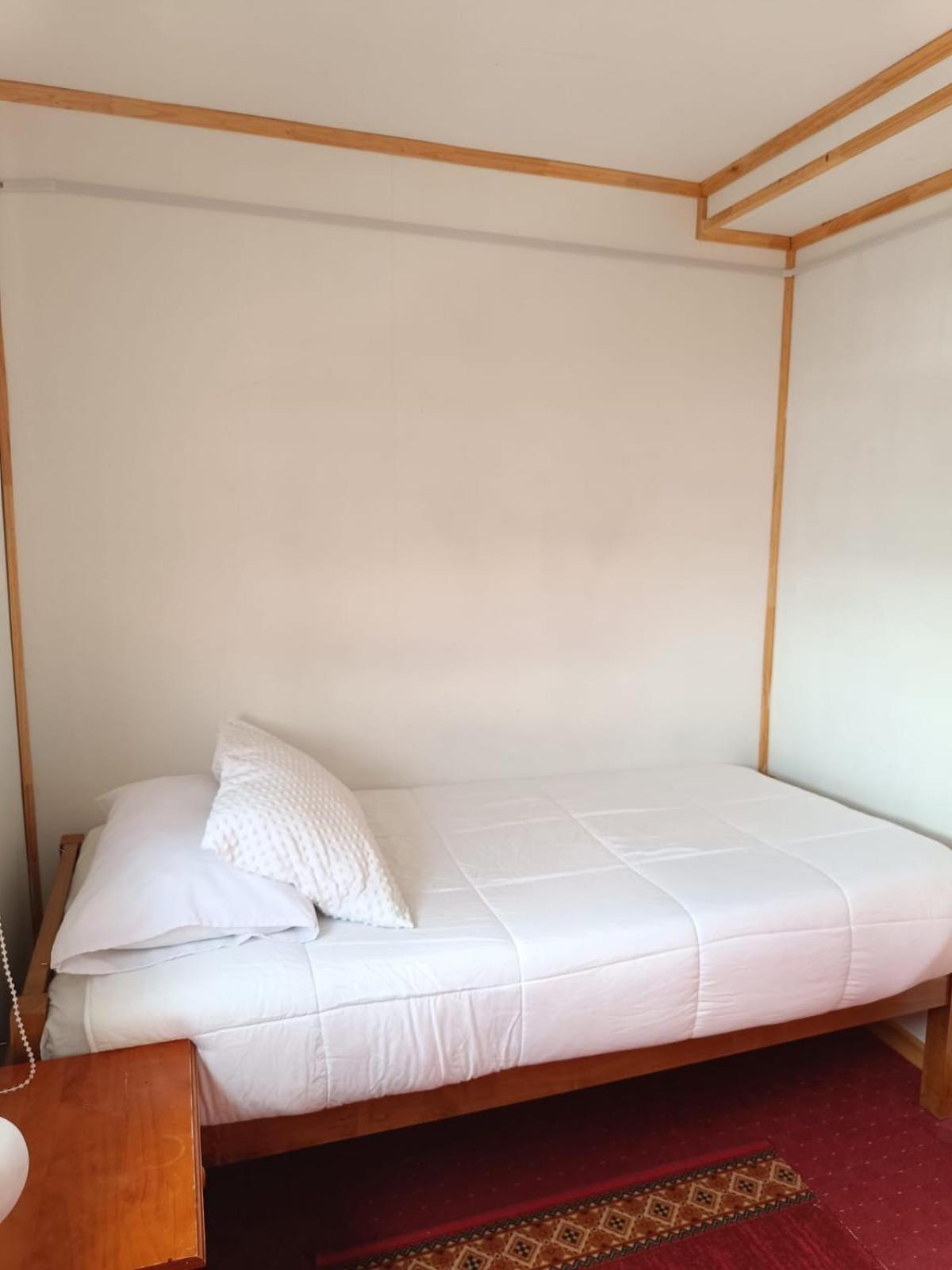 Hostal B&B Coastal Natales ปวยร์โตนาตาเลส ภายนอก รูปภาพ